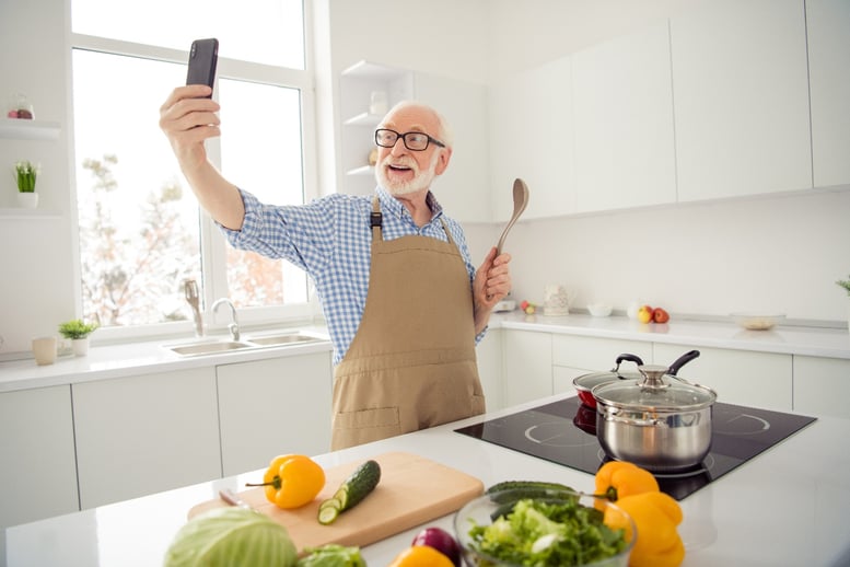 senior man cooking healthy food