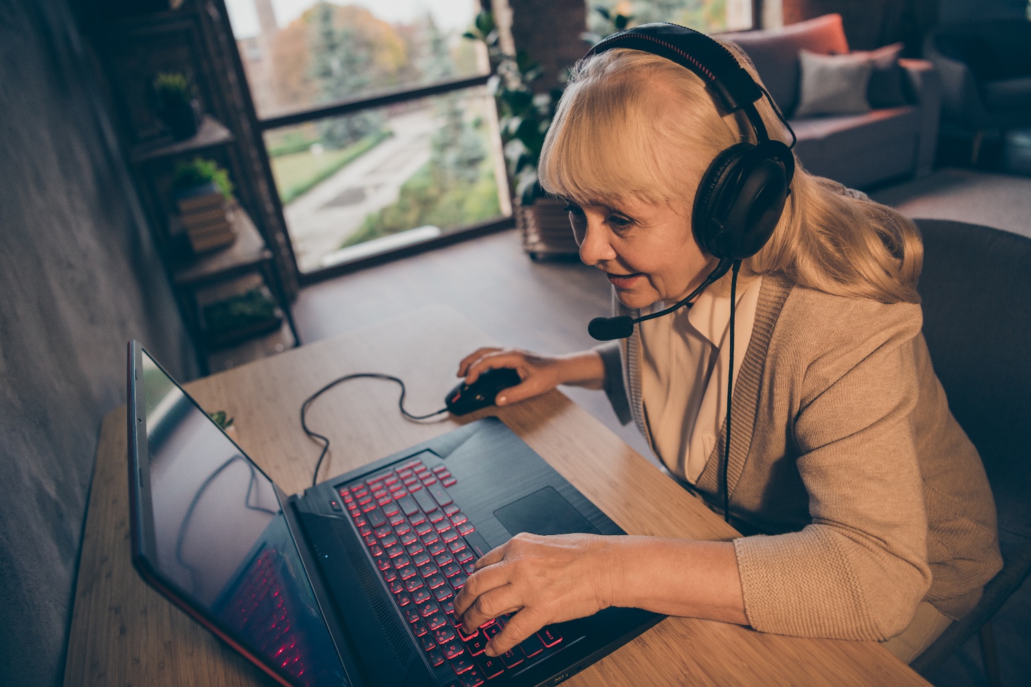 senior woman playing video games