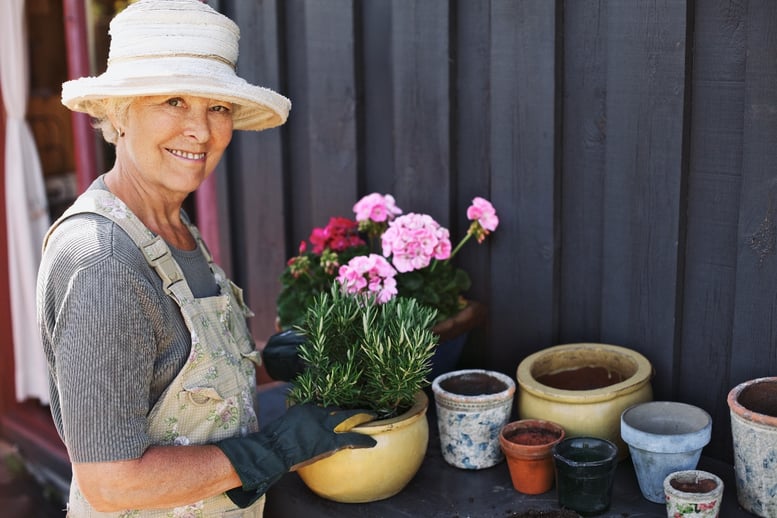 older adult woman in garden