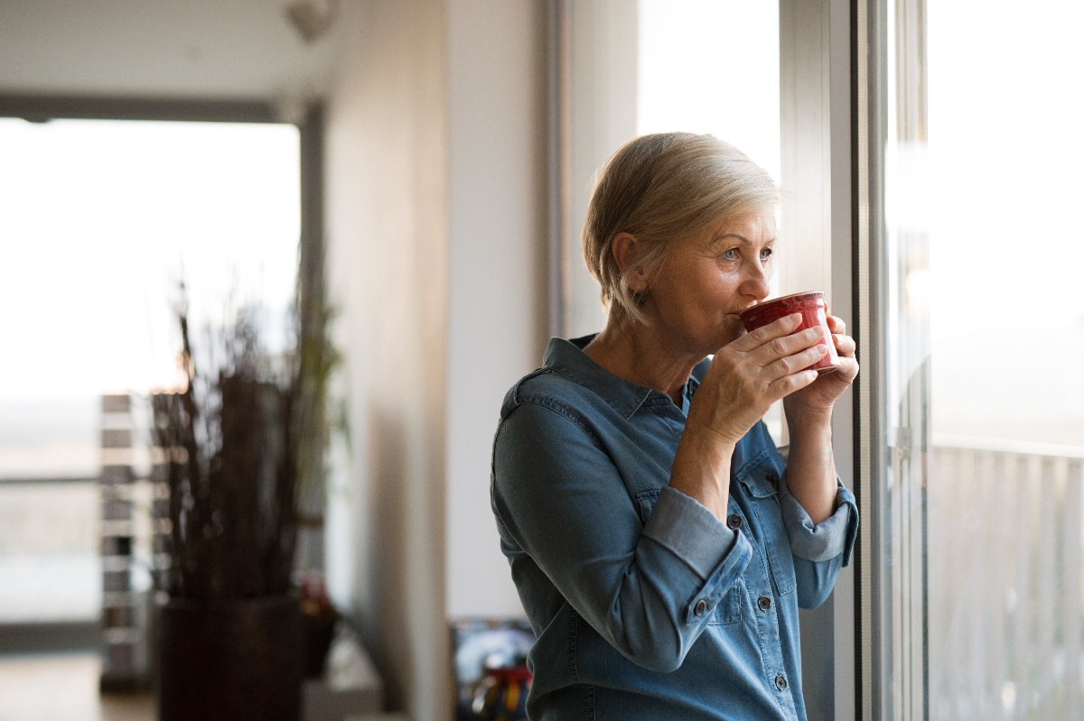 woman at home drinking coffee